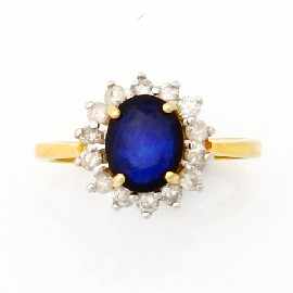 Appraisal: A ct gold blue stone and diamond cluster ring estimated