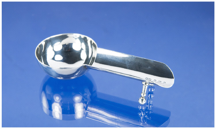 Appraisal: An Unusual Silver Brandy Measure The long pourer raised on