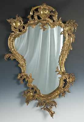 Appraisal: A Brass Rococo Style Mirror Heavy cast brass frame with