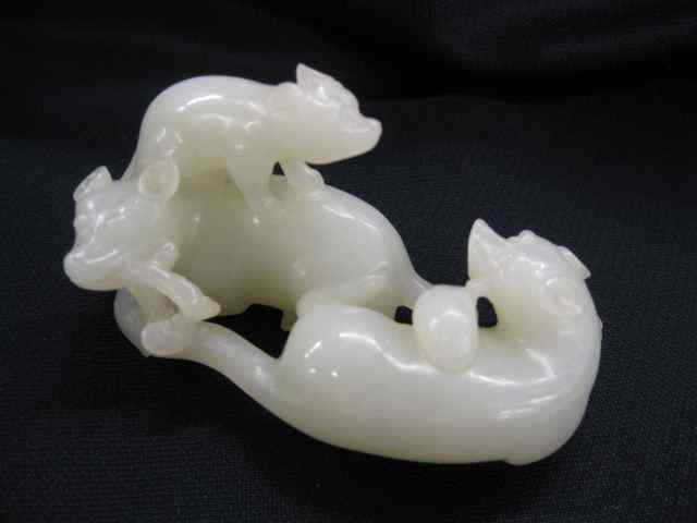 Appraisal: Chinese Carved Jade Figure a trio ofanimals '' X ''