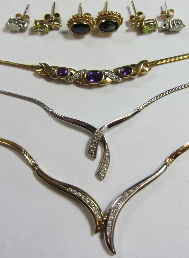 Appraisal: Two modern ct gold and small diamond necklaces an amethyst