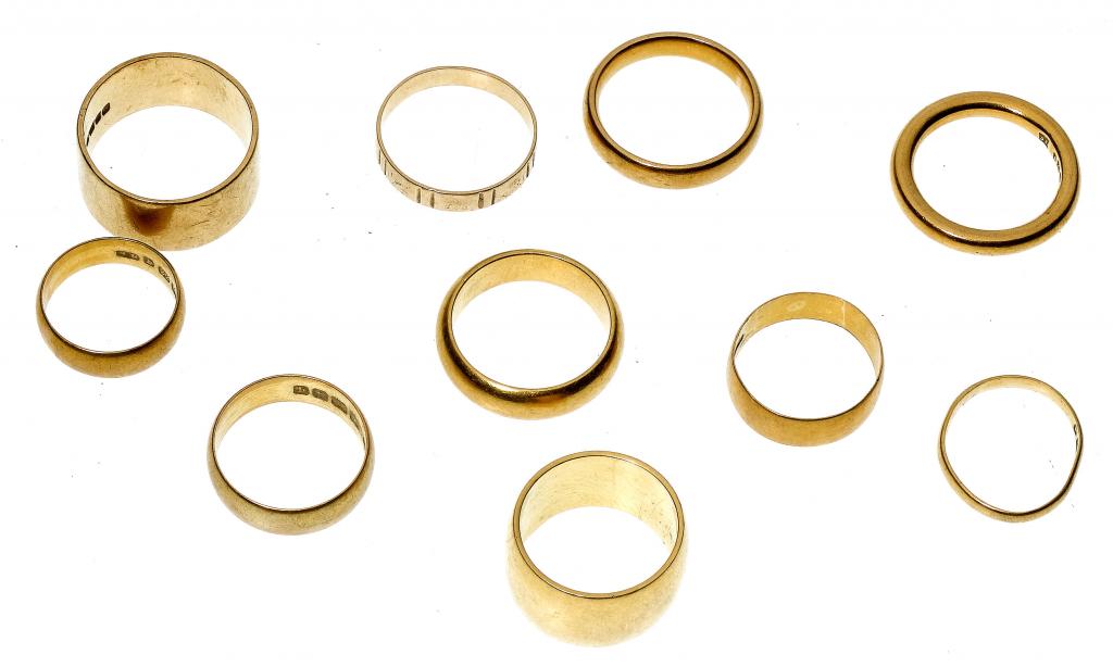 Appraisal: EIGHT CT AND TWO CT GOLD WEDDING RINGS