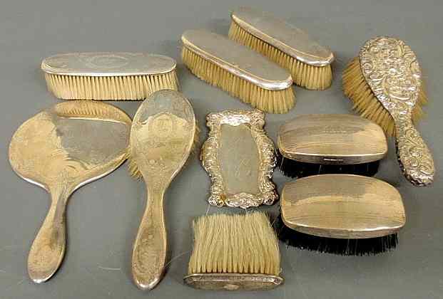 Appraisal: Large sterling silver assembled dresser set to include brushes mirrors