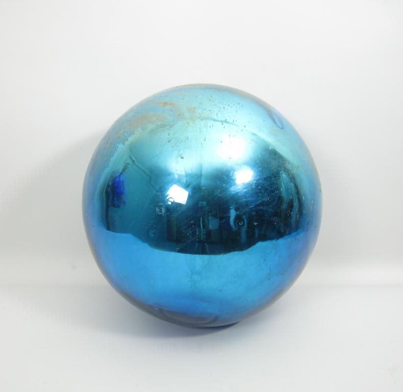 Appraisal: A large blue glass Witches Ball in