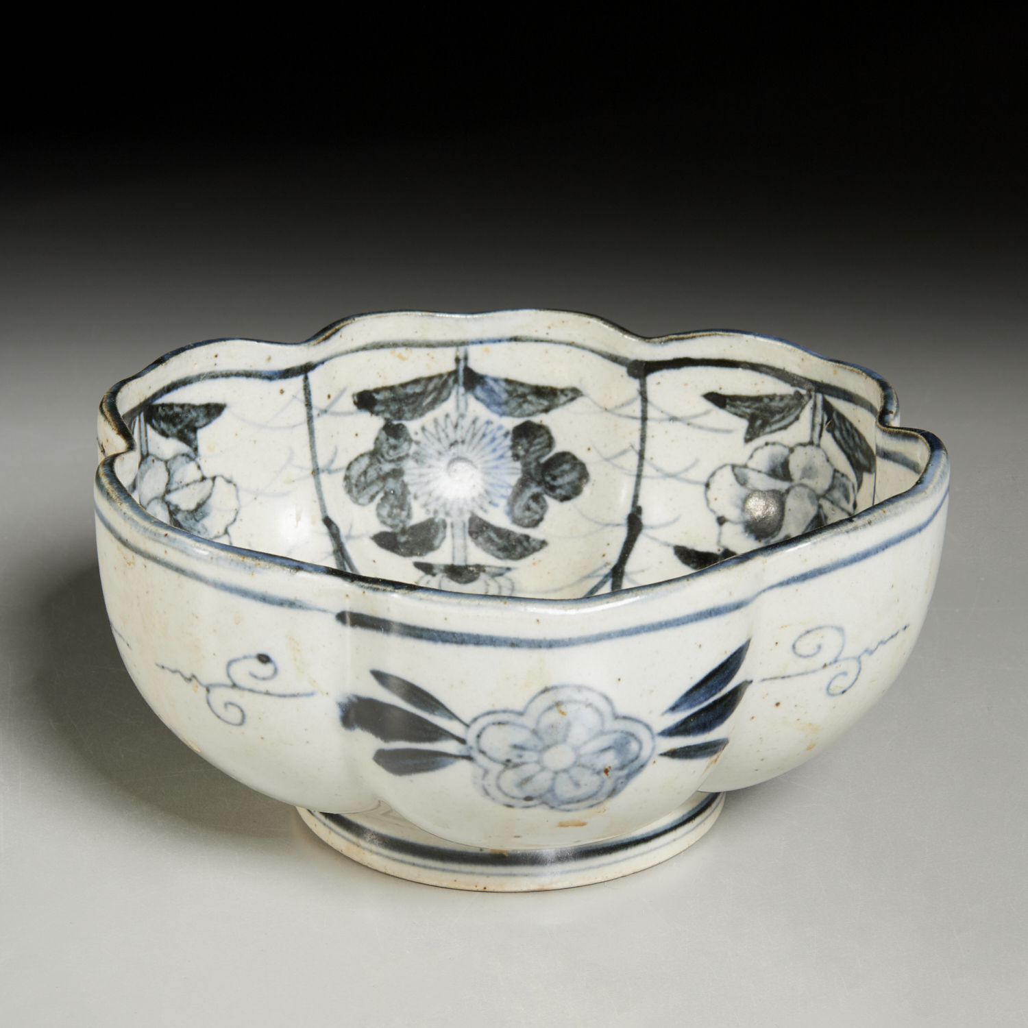 Appraisal: KOREAN LOBED BLUE AND WHITE BOWL Likely th c blue