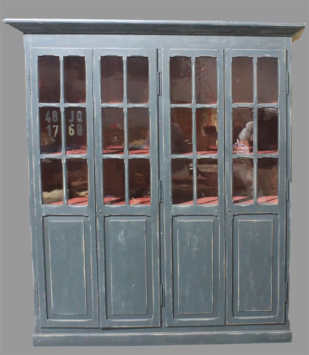 Appraisal: FRENCH BLUE PAINTED DOUBLE CUPBOARD having a molded top over