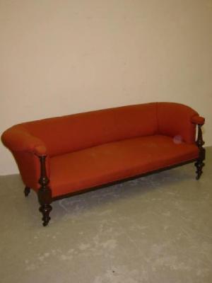 Appraisal: A VICTORIAN WALNUT FRAMED CHESTERFIELD SOFA upholstered in peach tapestry