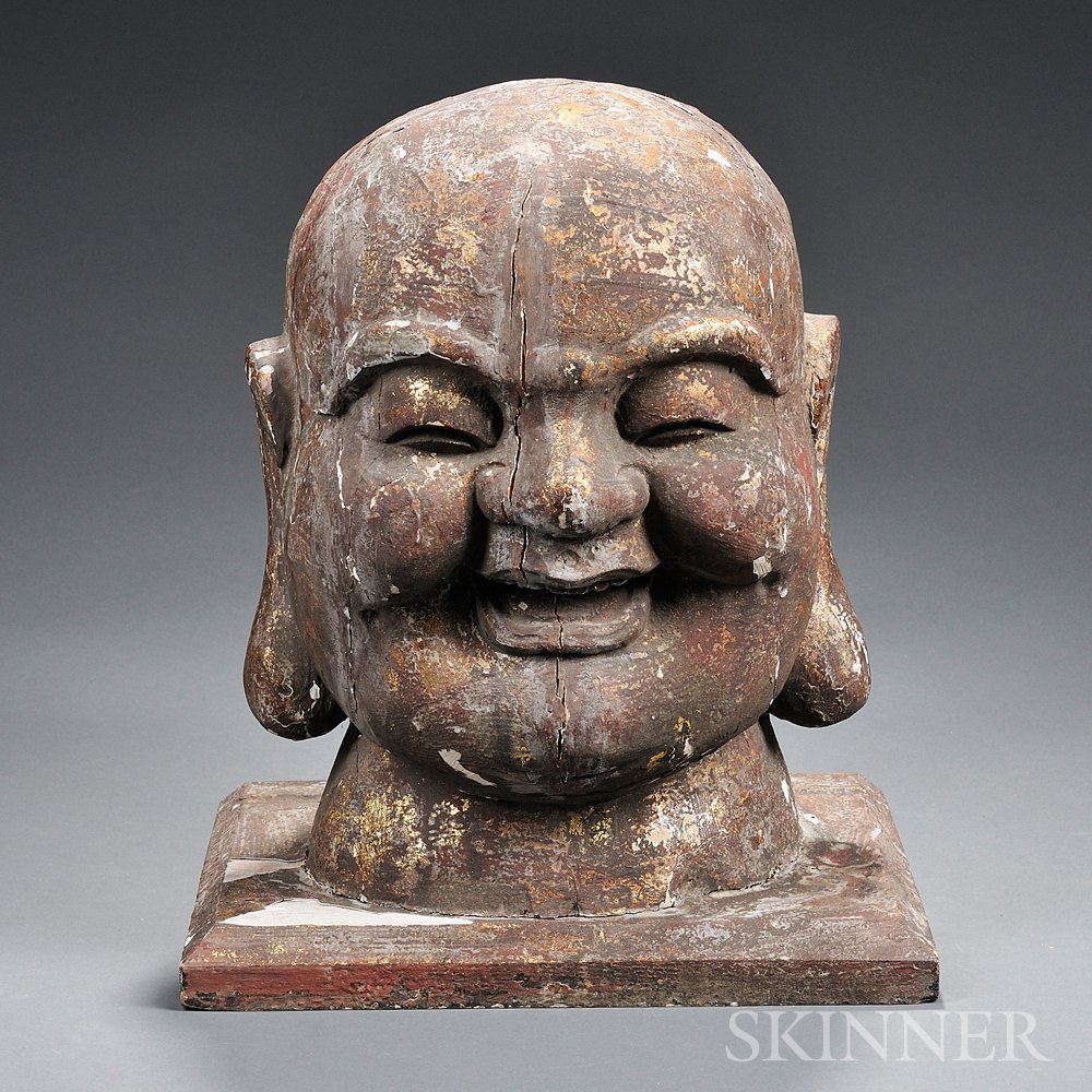 Appraisal: Buddha Head China th century the large head and square