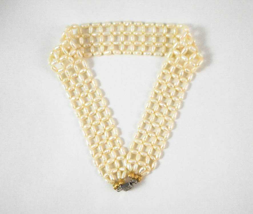 Appraisal: WOVEN BAROQUE WHITE PEARL CHOKER measuring inches in length having