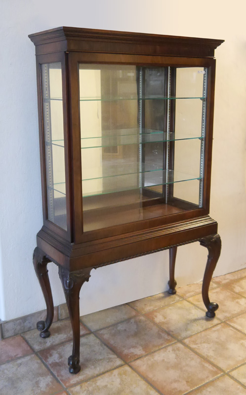 Appraisal: CHIPPENDALE STYLE CHINA CURIO CABINET Sliding glass front door mirrored