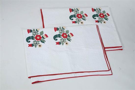 Appraisal: PAIR OF APPILQUE QUILTS Handsewn and quilted with embroidered details