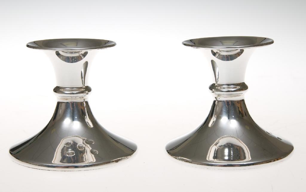 Appraisal: PAIR OF SMALL SILVER CANDLESTICKS of waisted form modern weighted