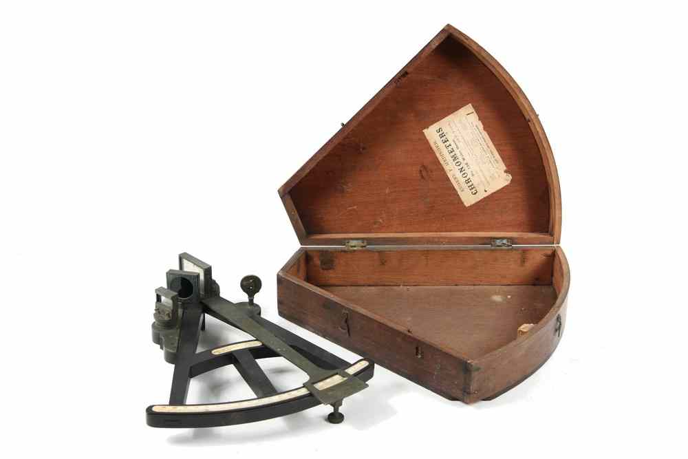 Appraisal: SEXTANT - th c ebony ivory and brass cased sextant