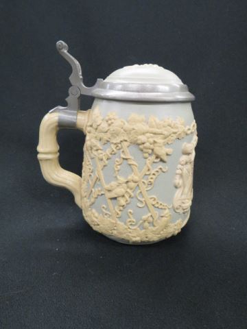 Appraisal: Mettlach Pottery Stein verse floral bas-relief inlaid pewter lid liter