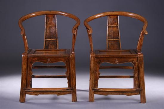 Appraisal: PAIR CHINESE YOKE-BACK ELMWOOD ARM CHAIRS th century - in