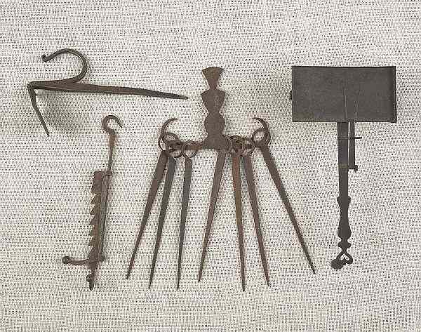 Appraisal: Collection of wrought iron to include a jamb spike a