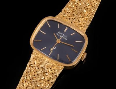 Appraisal: An ct gold Bulova 'Accutron' wristwatch the rectangular blue face