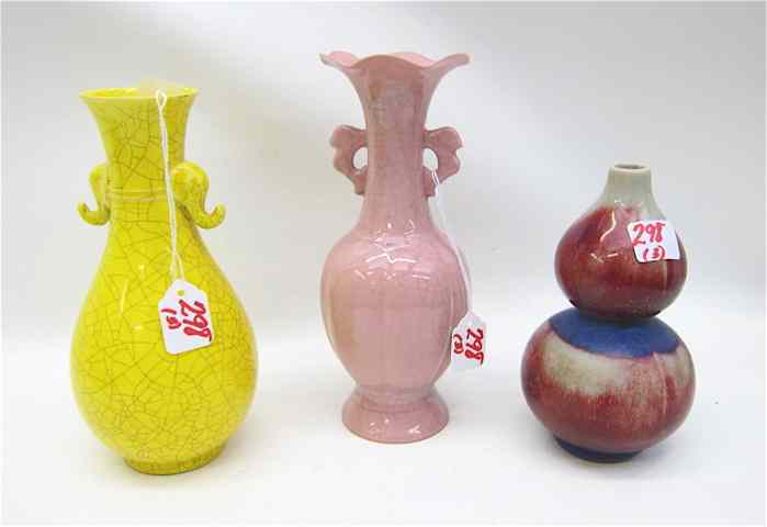 Appraisal: THREE SMALL CHINESE POTTERY VASES yellow crackle glaze '' tall