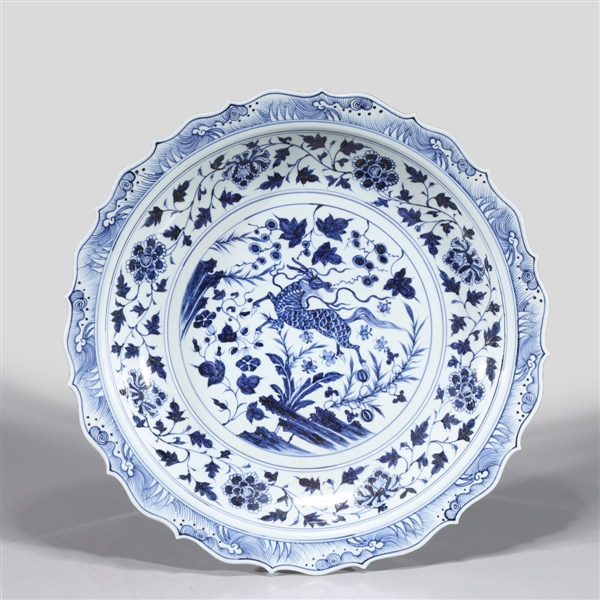 Appraisal: Chinese blue and white porcelain charger with flowers and Qilin