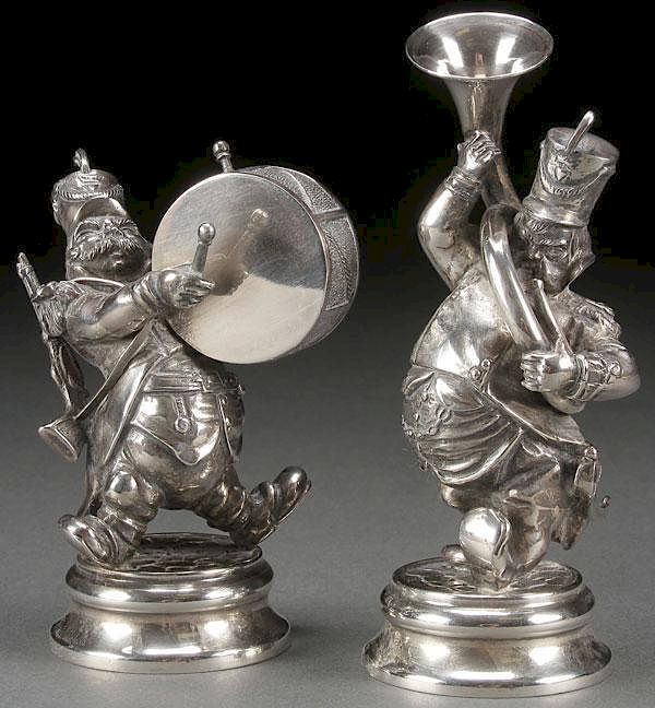 Appraisal: A PAIR OF SOUTH AMERICAN SILVER FIGURAL MUSICIANS A PAIR