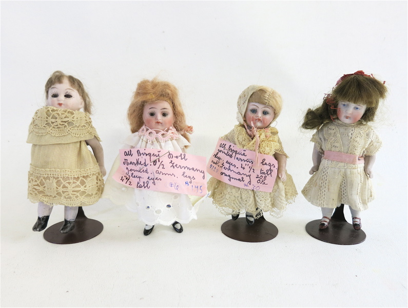 Appraisal: FOUR GERMAN MINIATURE BISQUE DOLLS two marked all have jointed