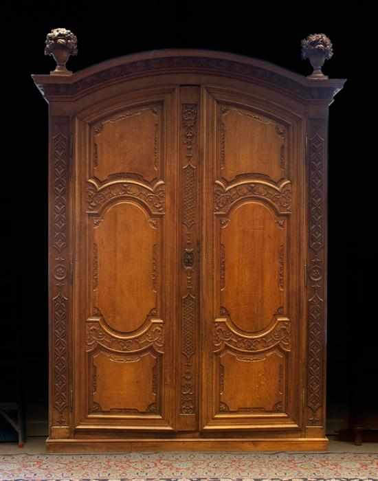 Appraisal: Monumental French Louis XV Country style carved oak armoire th