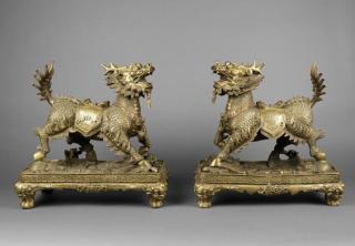 Appraisal: Pair of Chinese Brass Qilin figures ca Each raised on