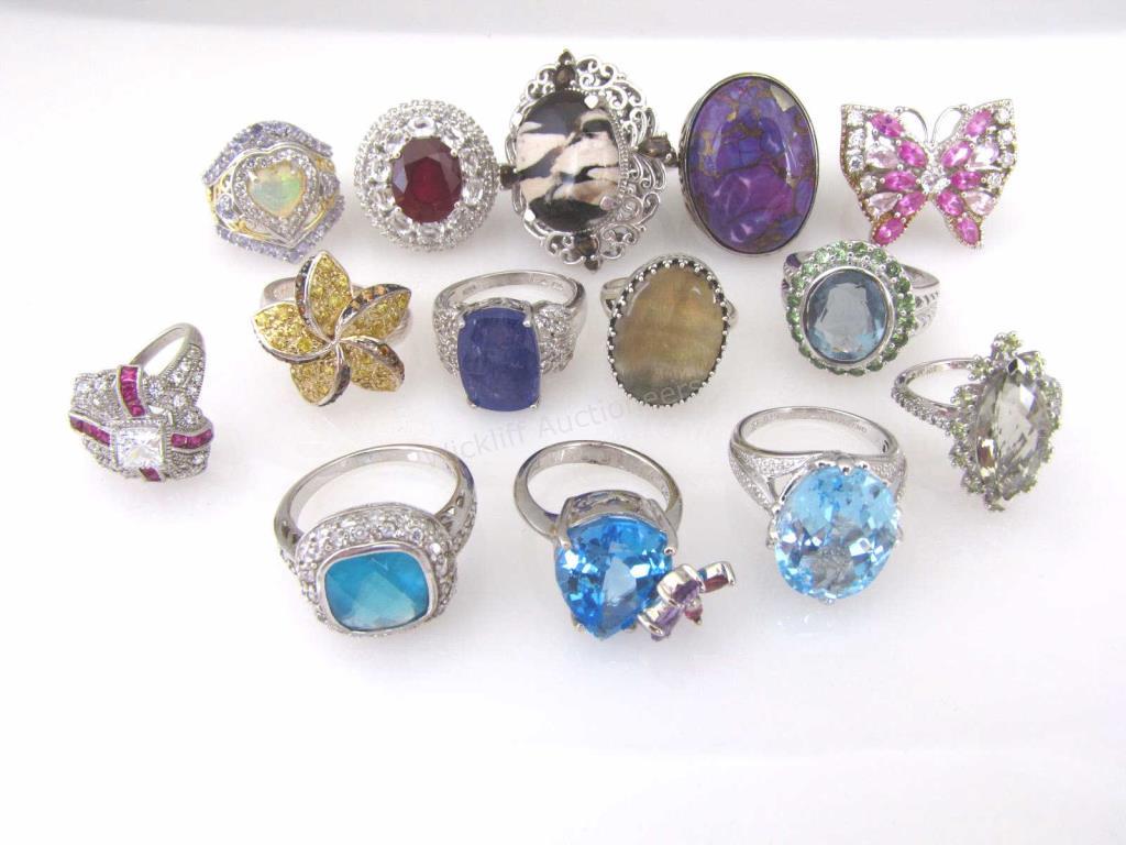 Appraisal: A group of sterling silver fashion rings all with faux