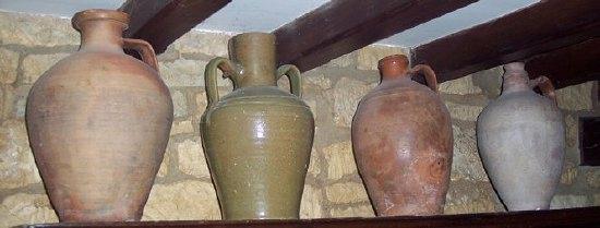 Appraisal: Four th Century Spanish terracotta jars with handles cm long