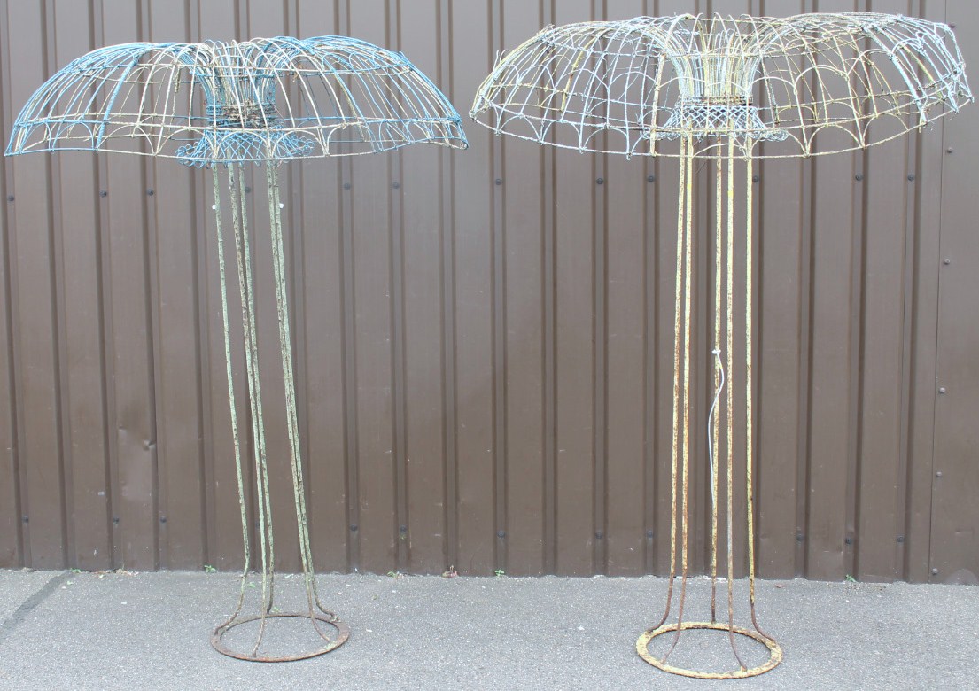 Appraisal: A near matching pair of Victorian wirework garden shades each