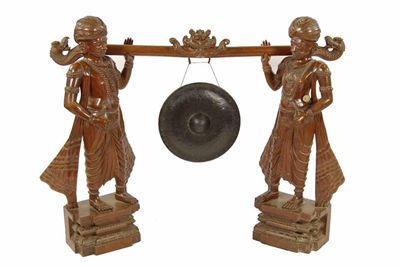 Appraisal: A large Anglo-Indian carved hardwood gong with turbanned male figure