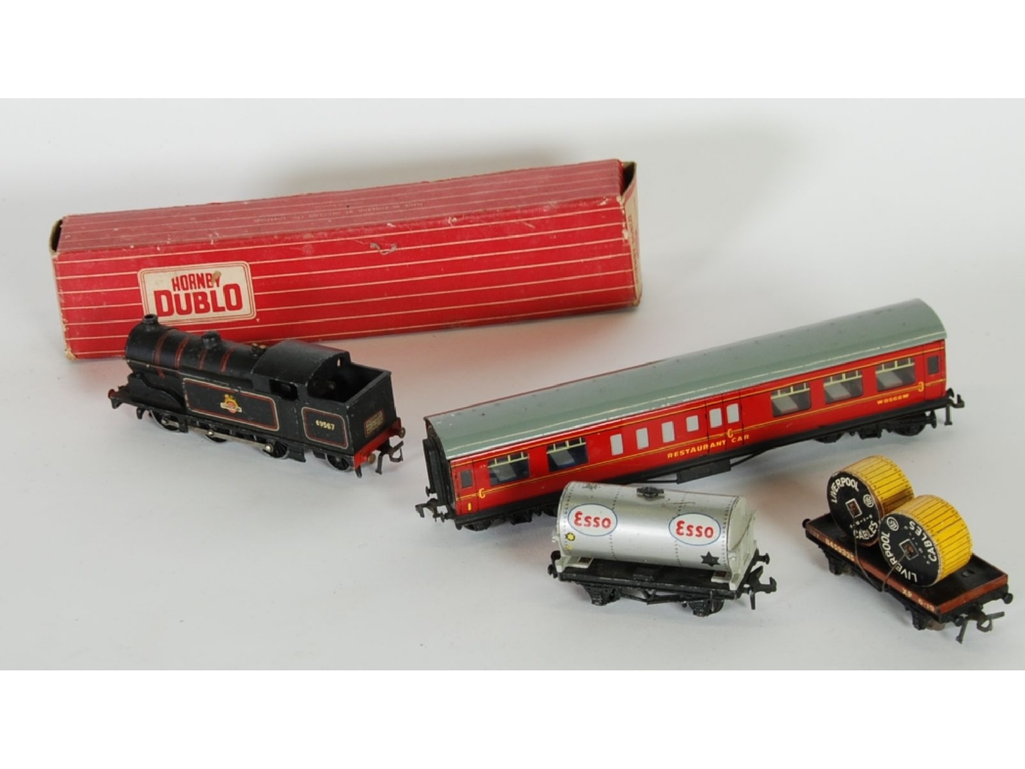 Appraisal: HORNBY DUBLO c THREE RAIL LOCO'S COACHES AND GOODS ROLLING