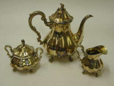 Appraisal: A SWEDISH THREE PIECE TEA SET post mark of lobed