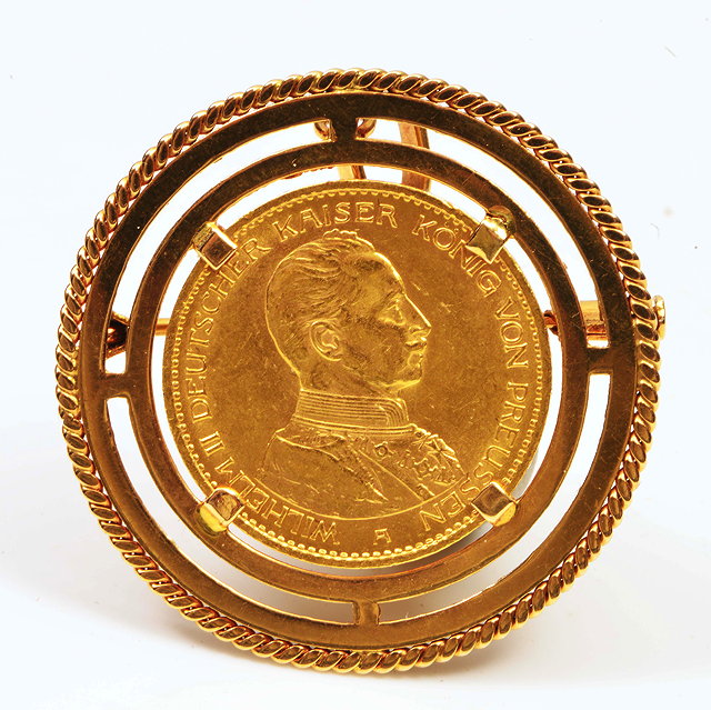 Appraisal: A GOLD MARK COIN dated and mounted within yellow metal