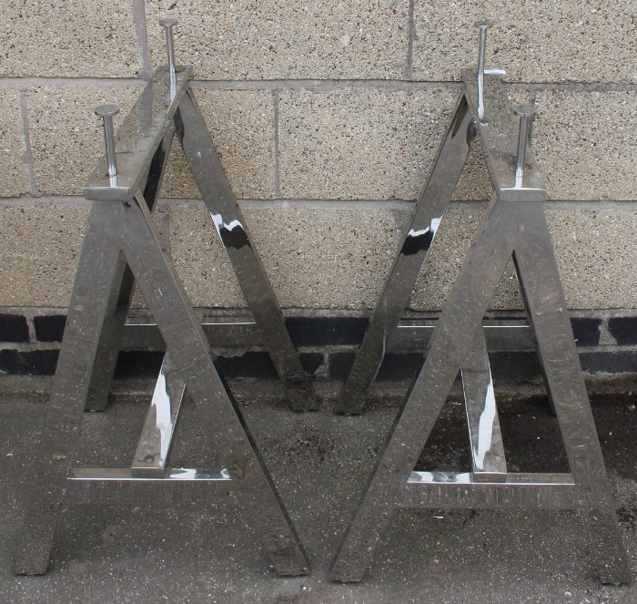 Appraisal: A pair of thC chrome plated table stands each of