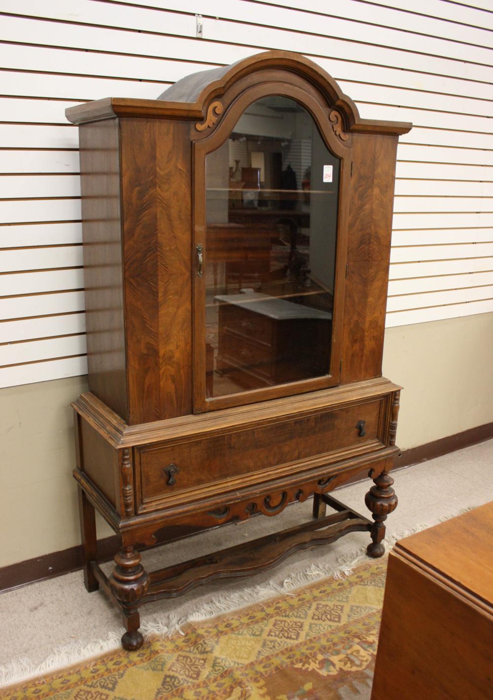 Appraisal: WALNUT CHINA CABINET ON STAND Premier Furniture Mfg Co High