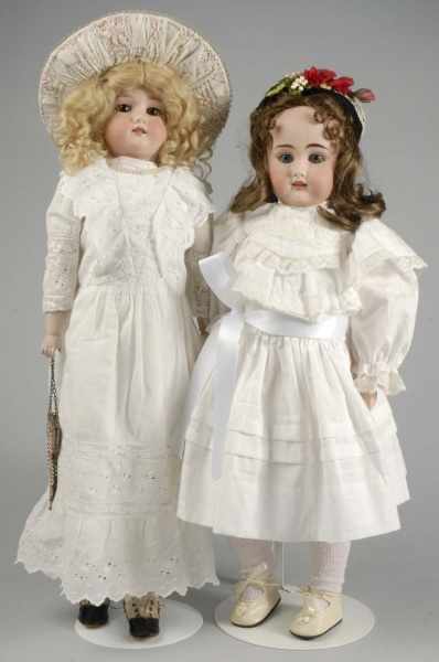 Appraisal: Lot of Pretty German Bisque Child Dolls Description Bisque socket