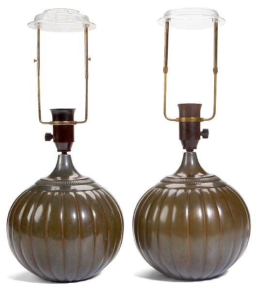 Appraisal: A pair of Just Andersen patinated diskometal lobed lamps circa