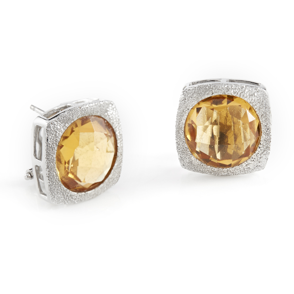 Appraisal: A pair of citrine set earrings each of rounded square