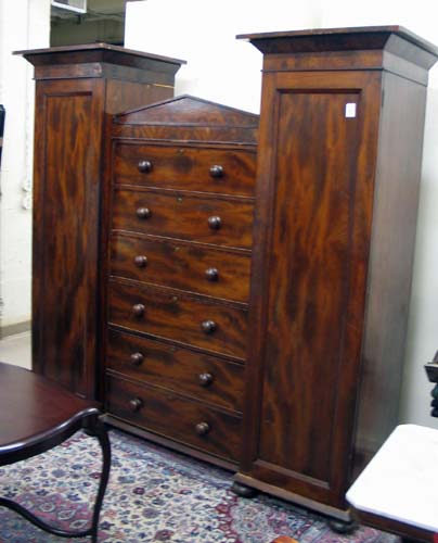 Appraisal: EMPIRE VICTORIAN TRANSITIONAL MAHOGANY WARDROBE English mid th century This