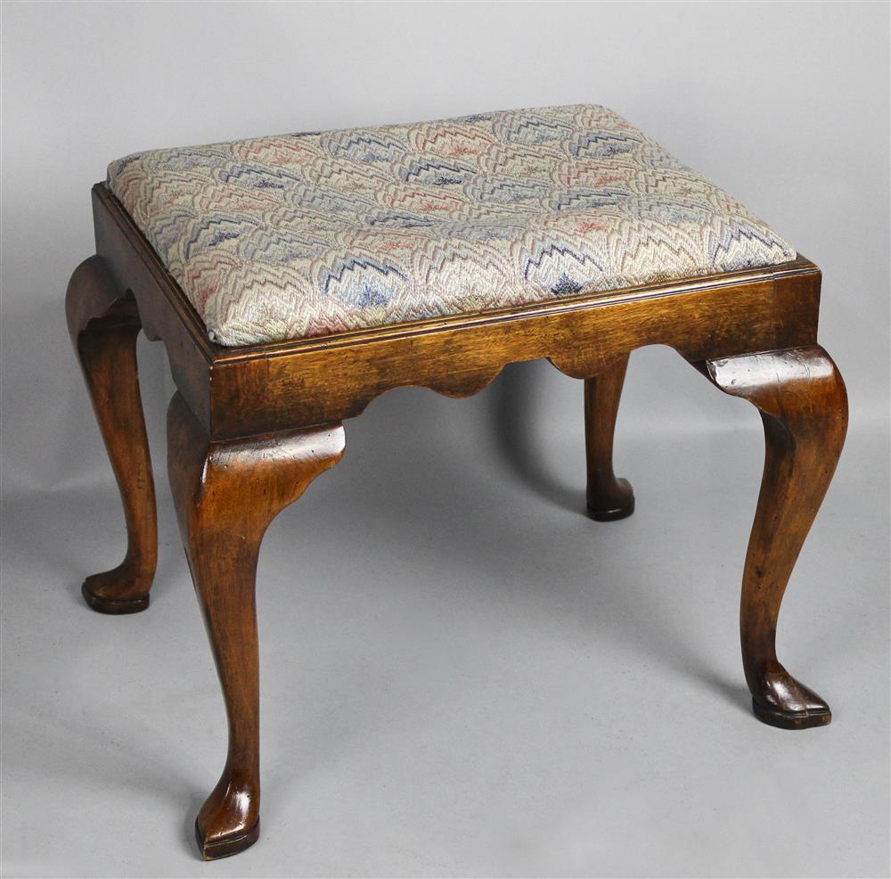 Appraisal: QUEEN ANNE STYLE MAHOGANY STOOL the rectangular slip seat over