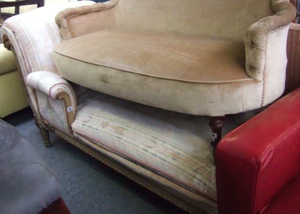 Appraisal: A th century carved and gilt beechwood framed chaise lounge