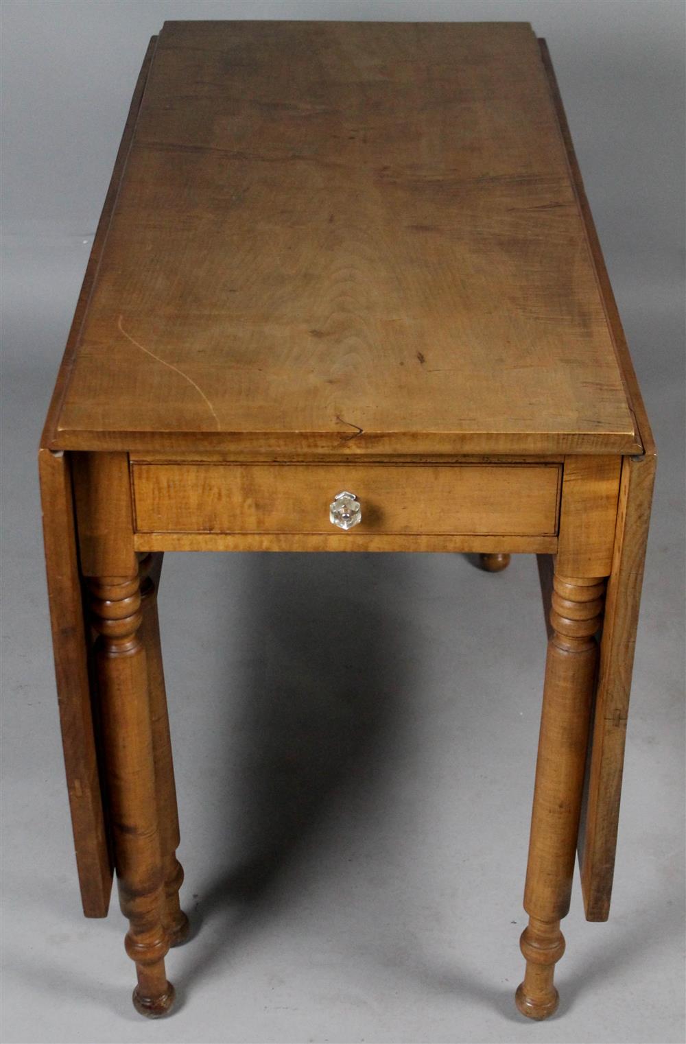 Appraisal: LATE SHERATON FIGURED MAPLE DROP LEAF TABLE having a rectangular