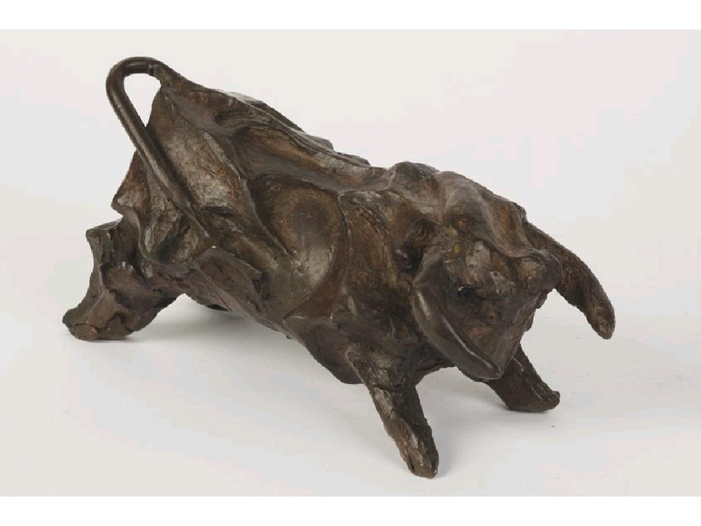 Appraisal: COSSIO A CAST BRONZE SCULPTURE OF A CHARGING BULL indistinctly