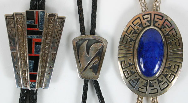 Appraisal: Three Native American bolo ties one with large oval lapis