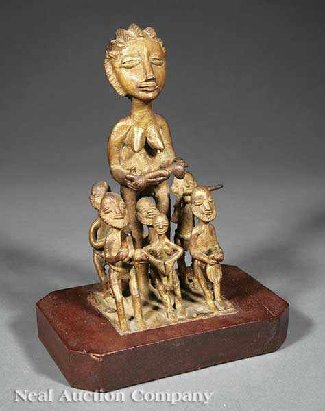 Appraisal: A Nigerian Yoruba Bronze Ogboni Figural Group the central standing