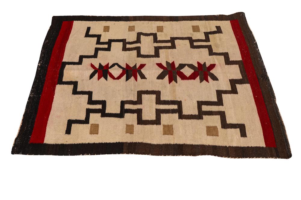 Appraisal: NAVAJO WOOL BLANKETwoven in brown tan red and cream Condition