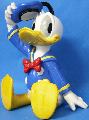 Appraisal: Scmid Walt Disney Musical figure of Donald Duck playing Here