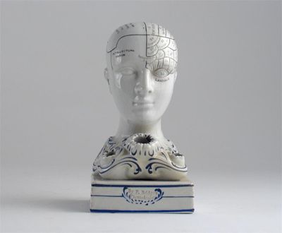 Appraisal: An English phrenological head as an inkwell stamped 'By F