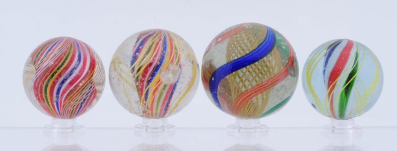 Appraisal: Lot Of Large Swirl Marbles Lot includes three multicolor divided